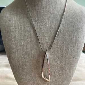 Silver geometric necklace by Premier Jewelry